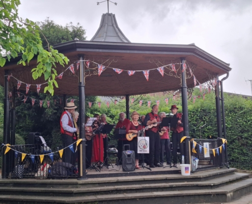 Saffron Walden band stand with a band playing music